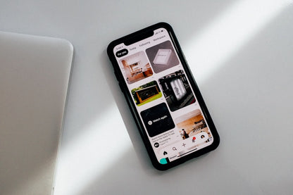 3-in-1 wireless charging pad on minimalist nightstand charging phone watch earbuds